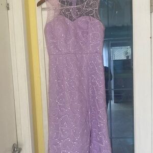 Purple sequins dress, with hearts shapes all around the dress